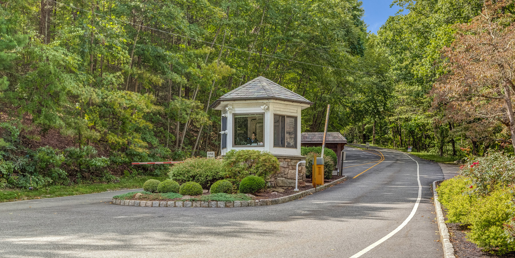The North Gate of Smoke Rise — private gated entrance to the 2,500-acre community in Kinnelon, NJ